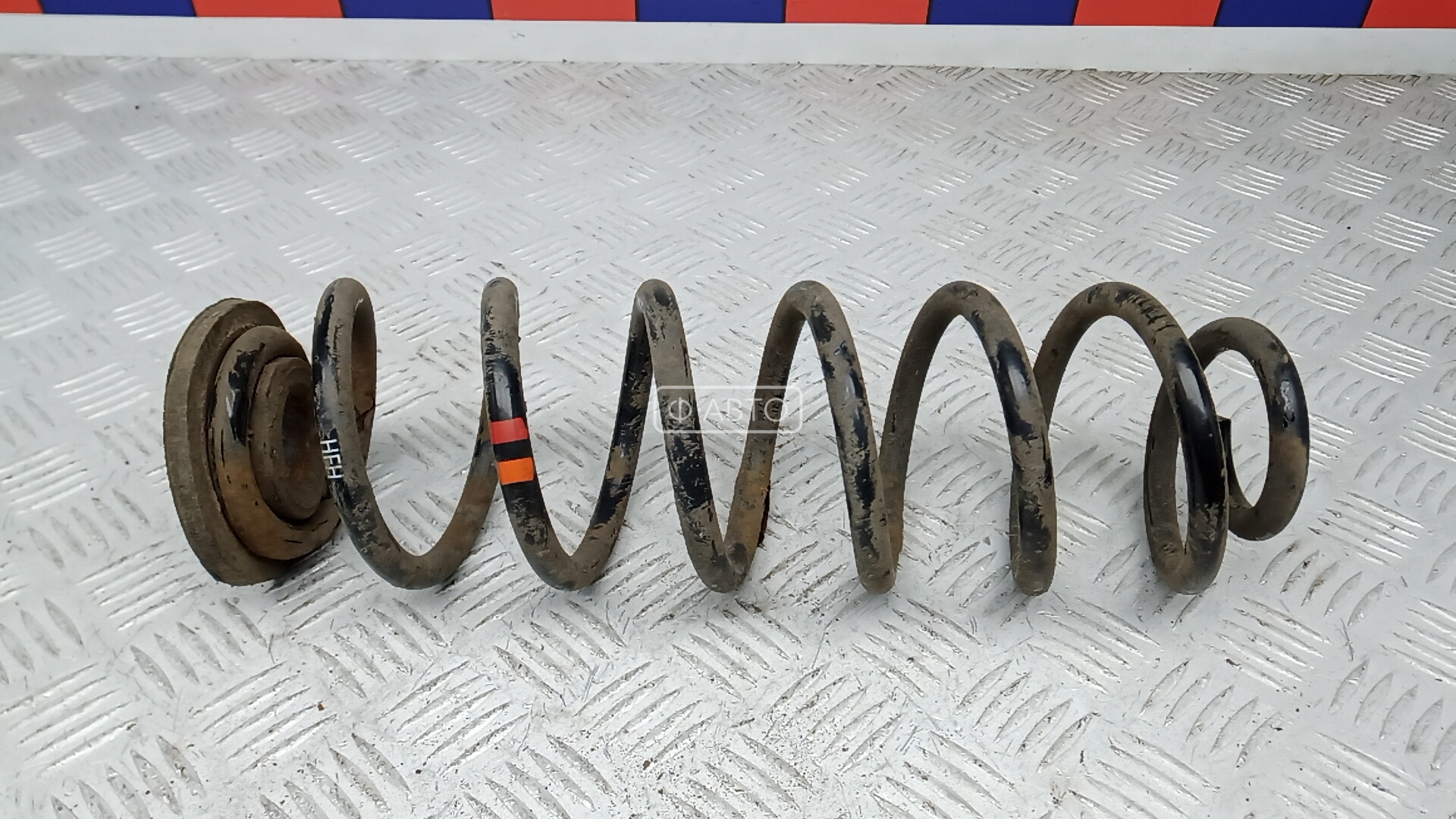 Пружина задняя