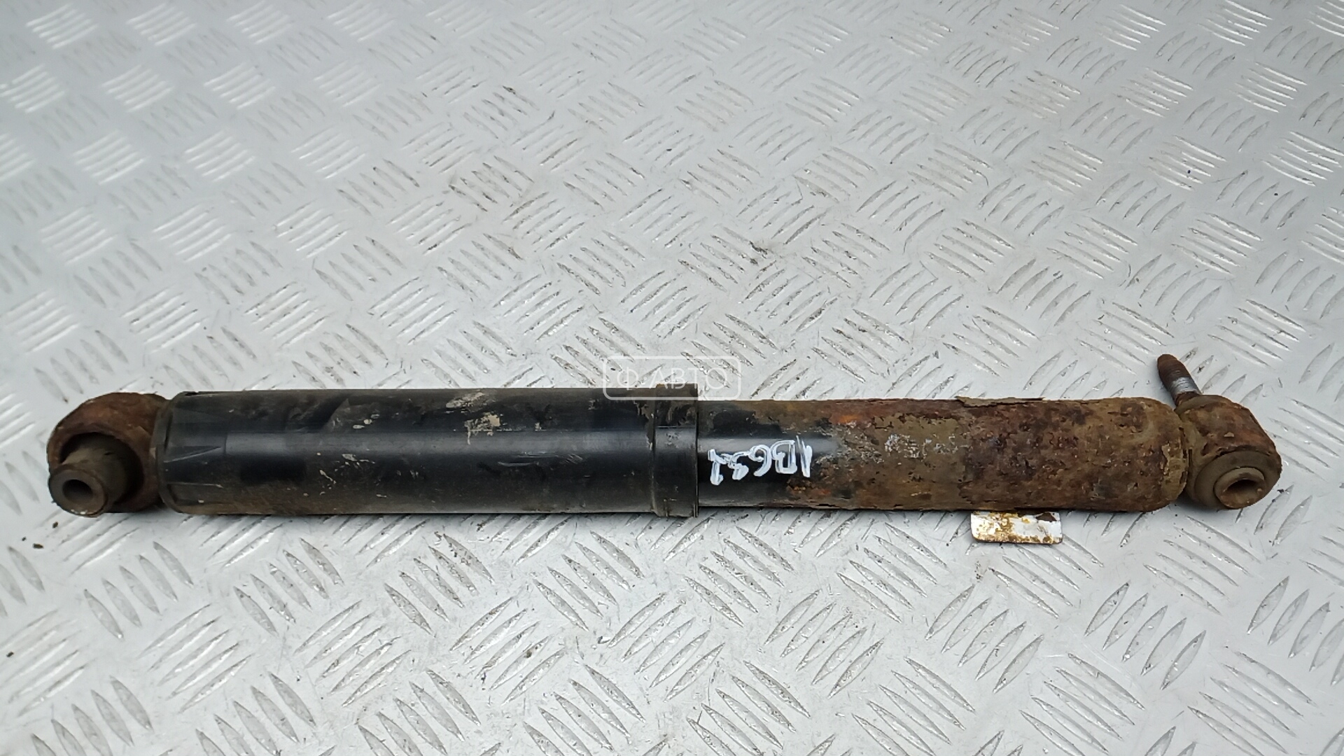 Амортизатор задней балки