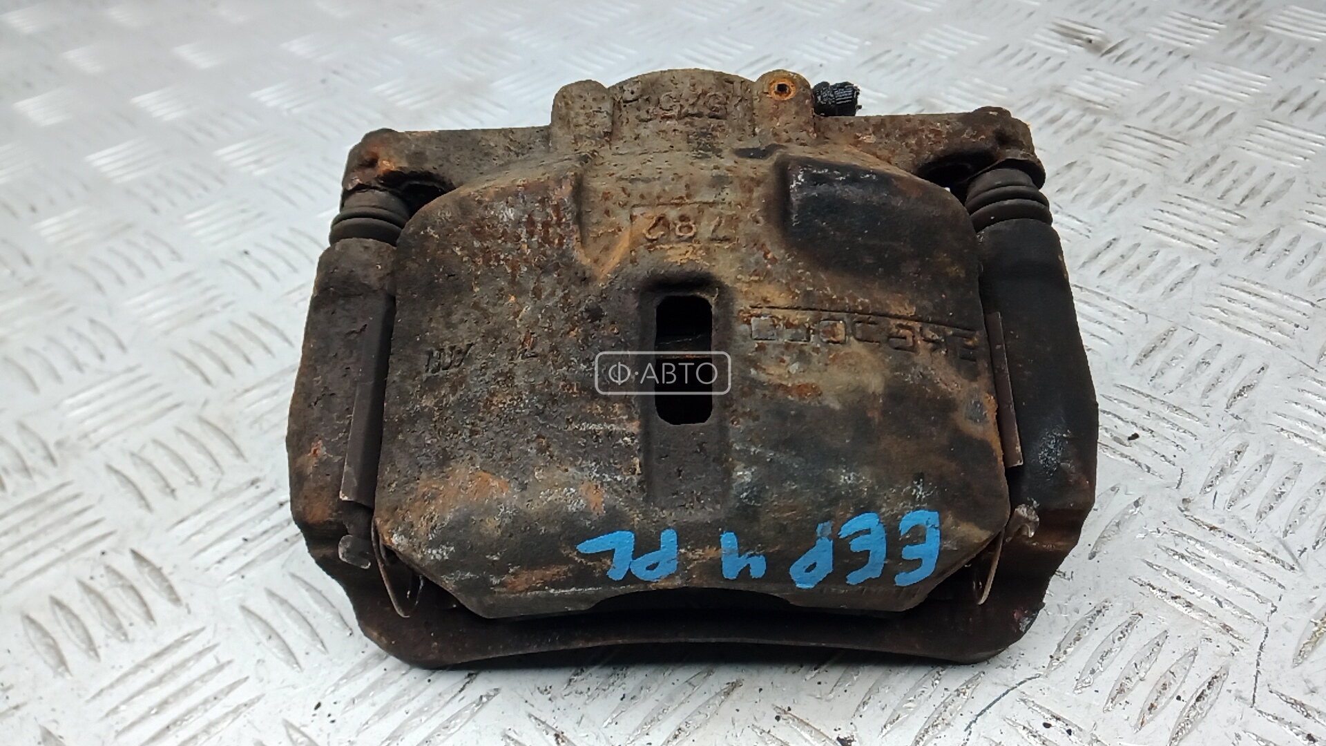 Суппорт тормозной передний левый