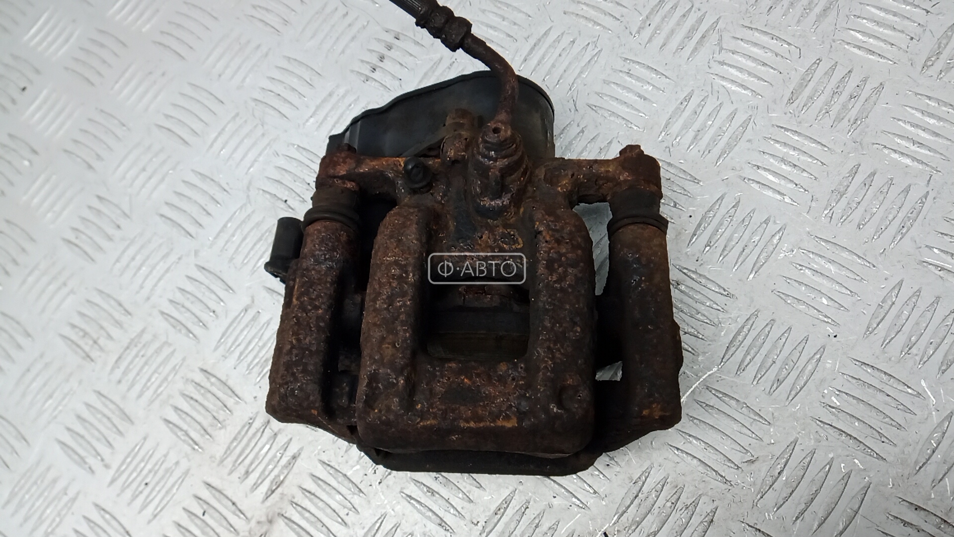 Суппорт тормозной задний левый