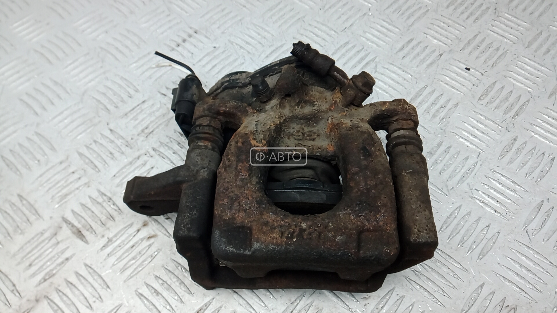 Суппорт тормозной задний левый