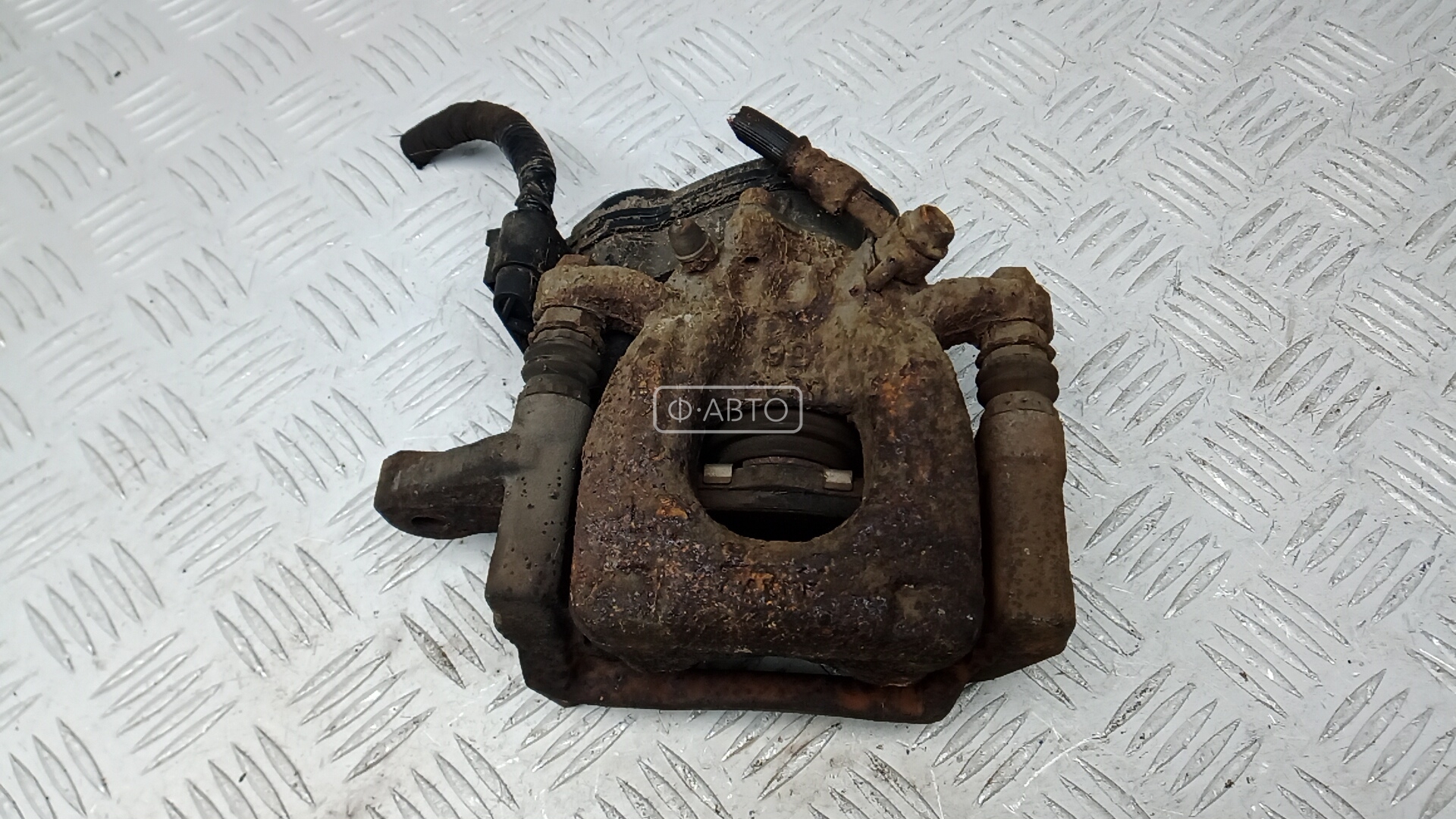 Суппорт тормозной задний левый