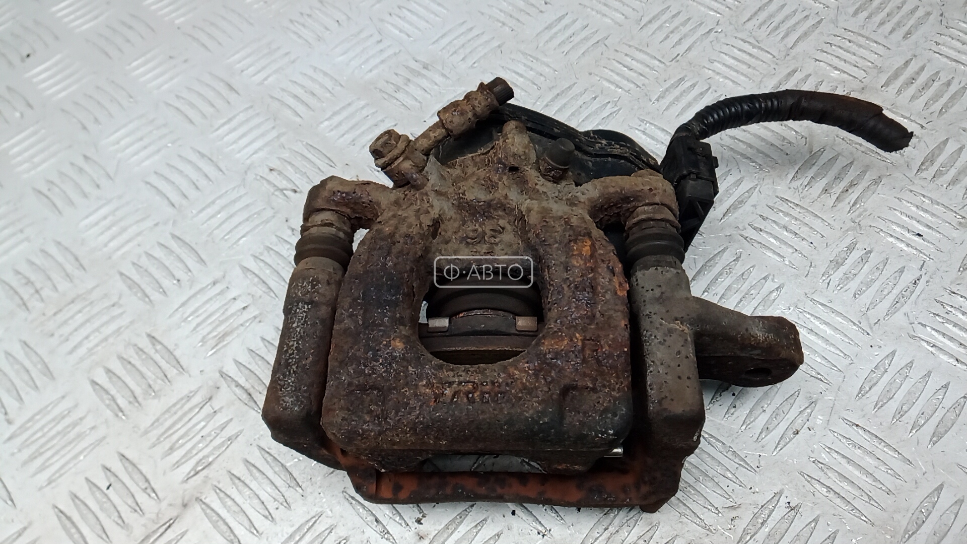 Суппорт тормозной задний правый