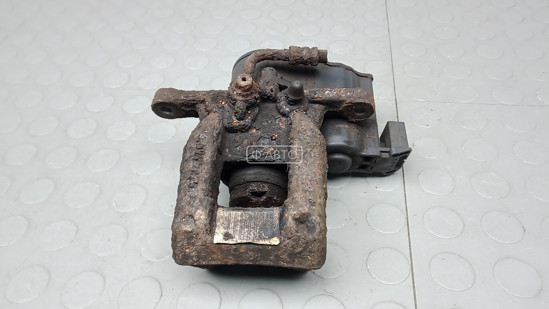 Суппорт тормозной задний левый