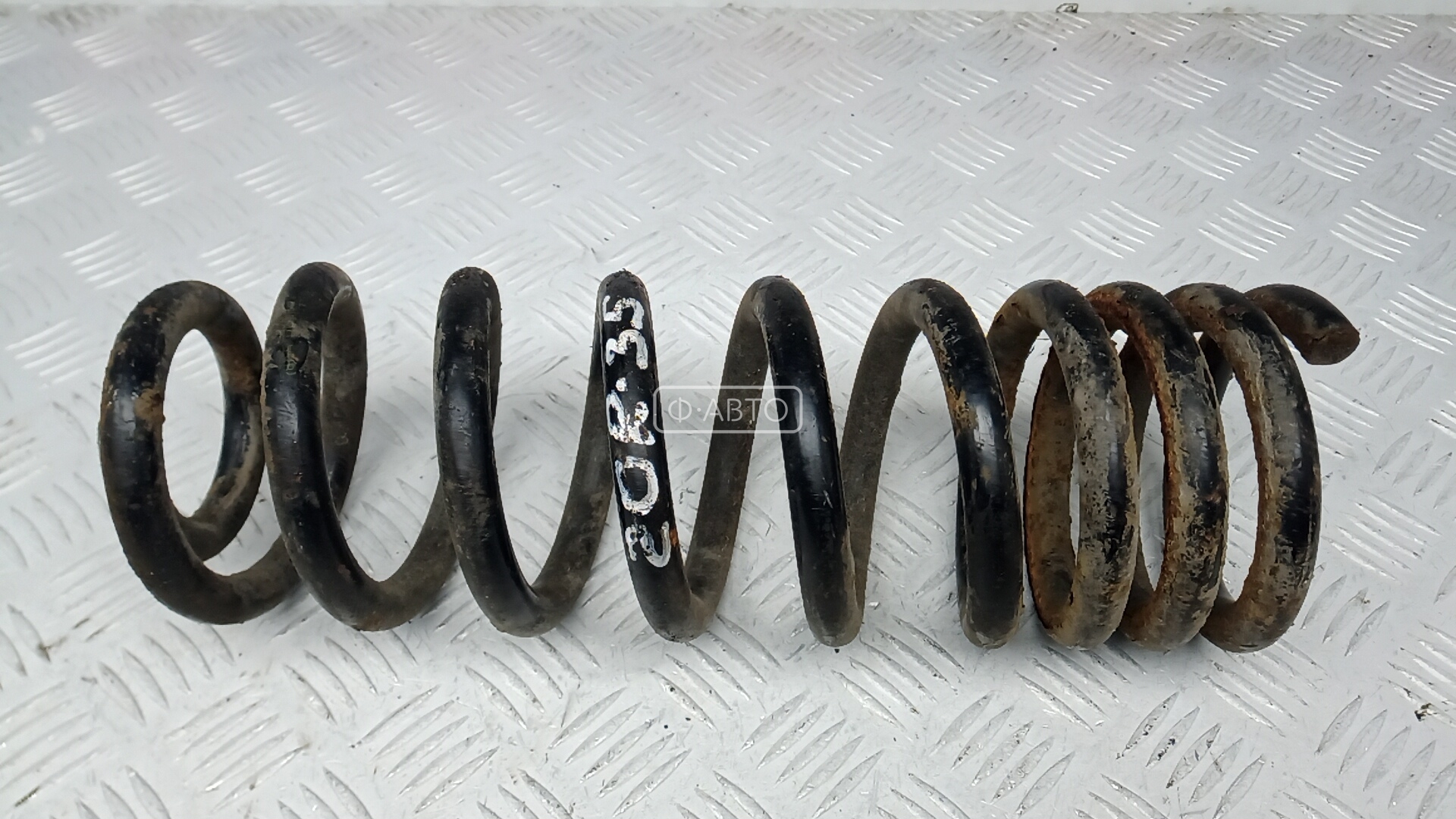 Пружина задняя