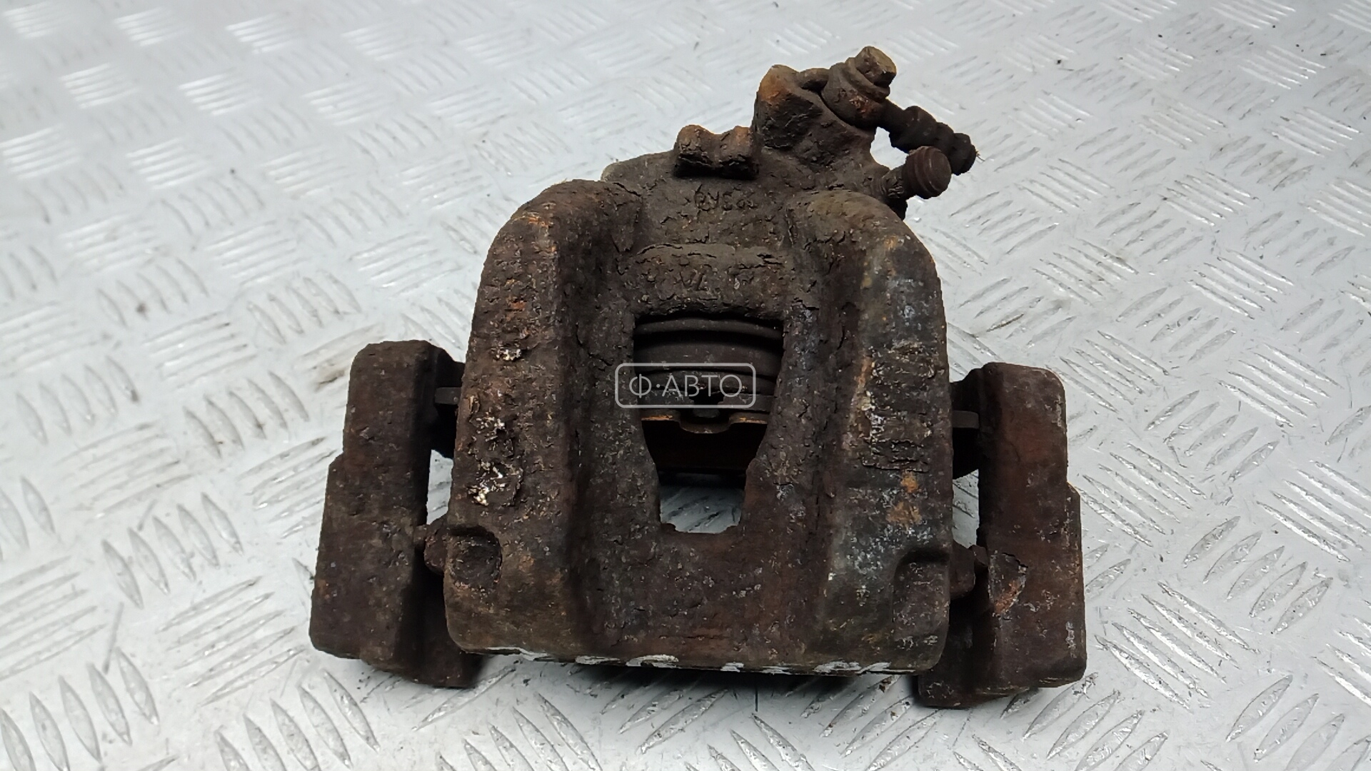 Суппорт тормозной передний левый