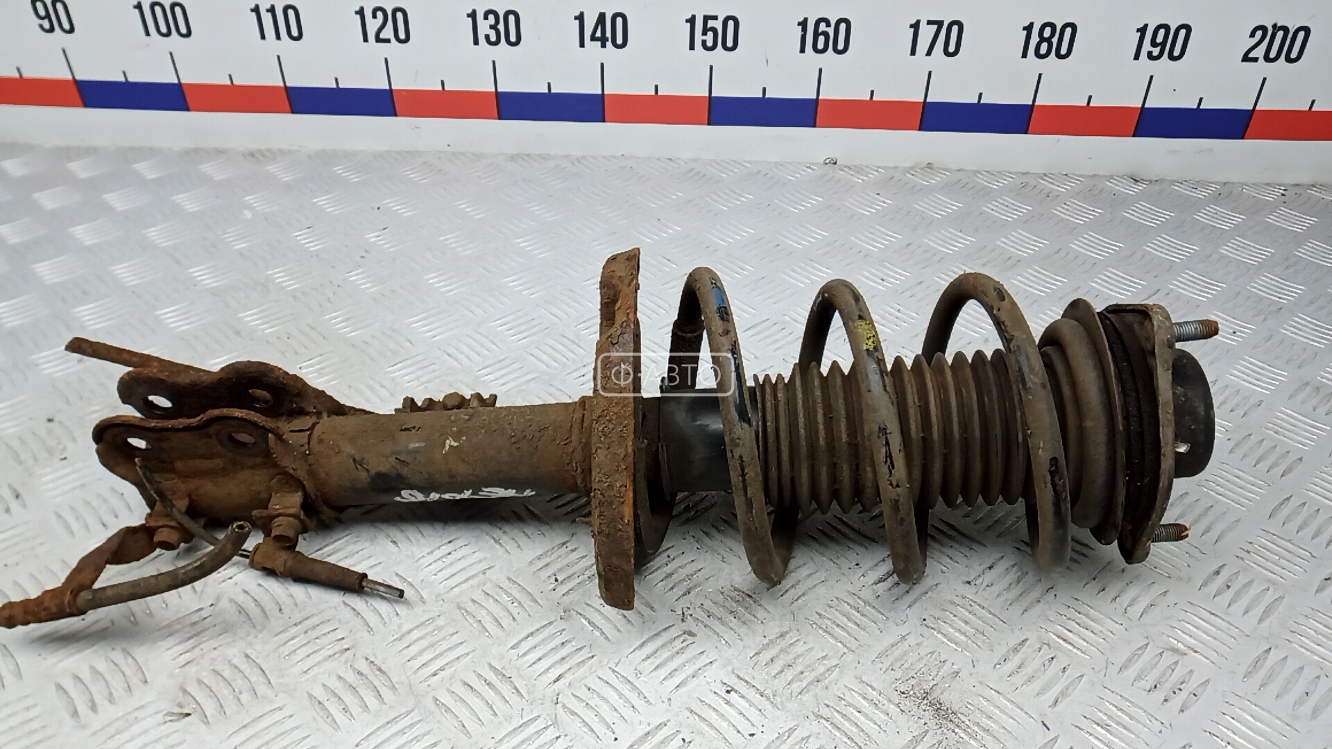 Амортизатор передний левый