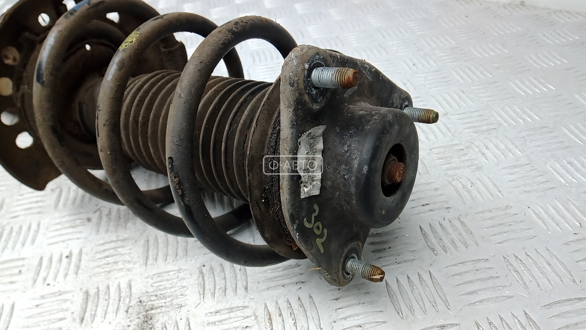 Амортизатор передний левый