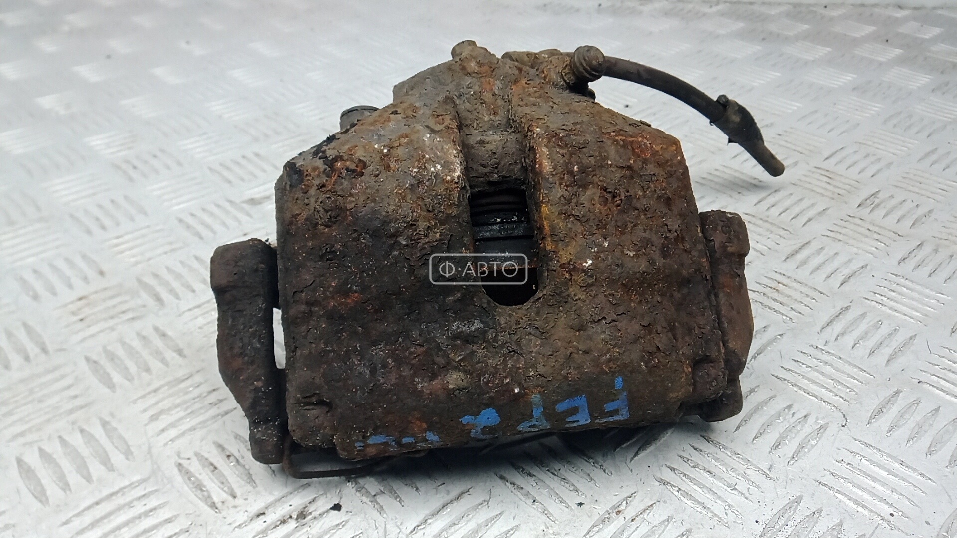Суппорт тормозной передний левый