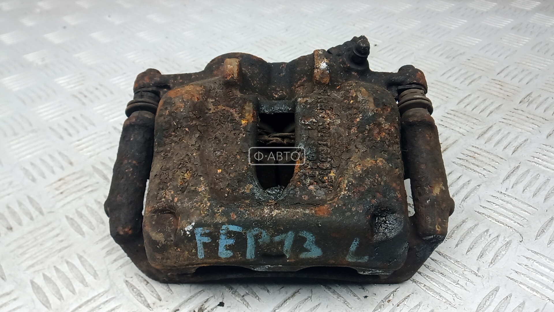 Суппорт тормозной передний левый