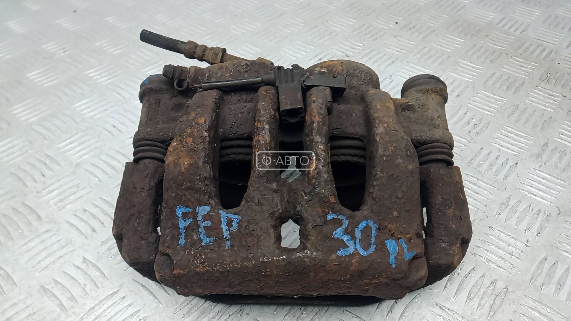 Суппорт тормозной передний левый