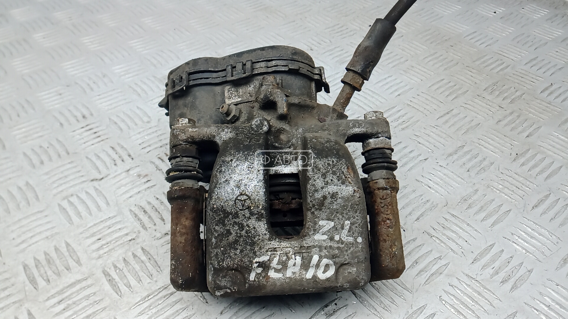 Суппорт тормозной задний левый