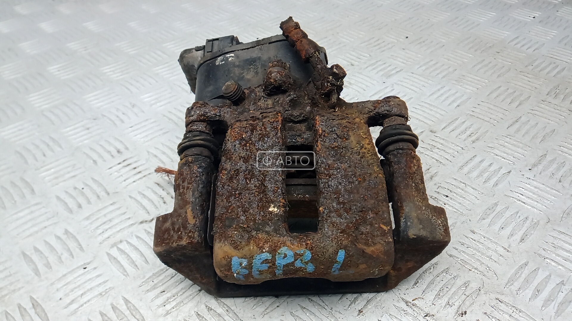 Суппорт тормозной задний левый