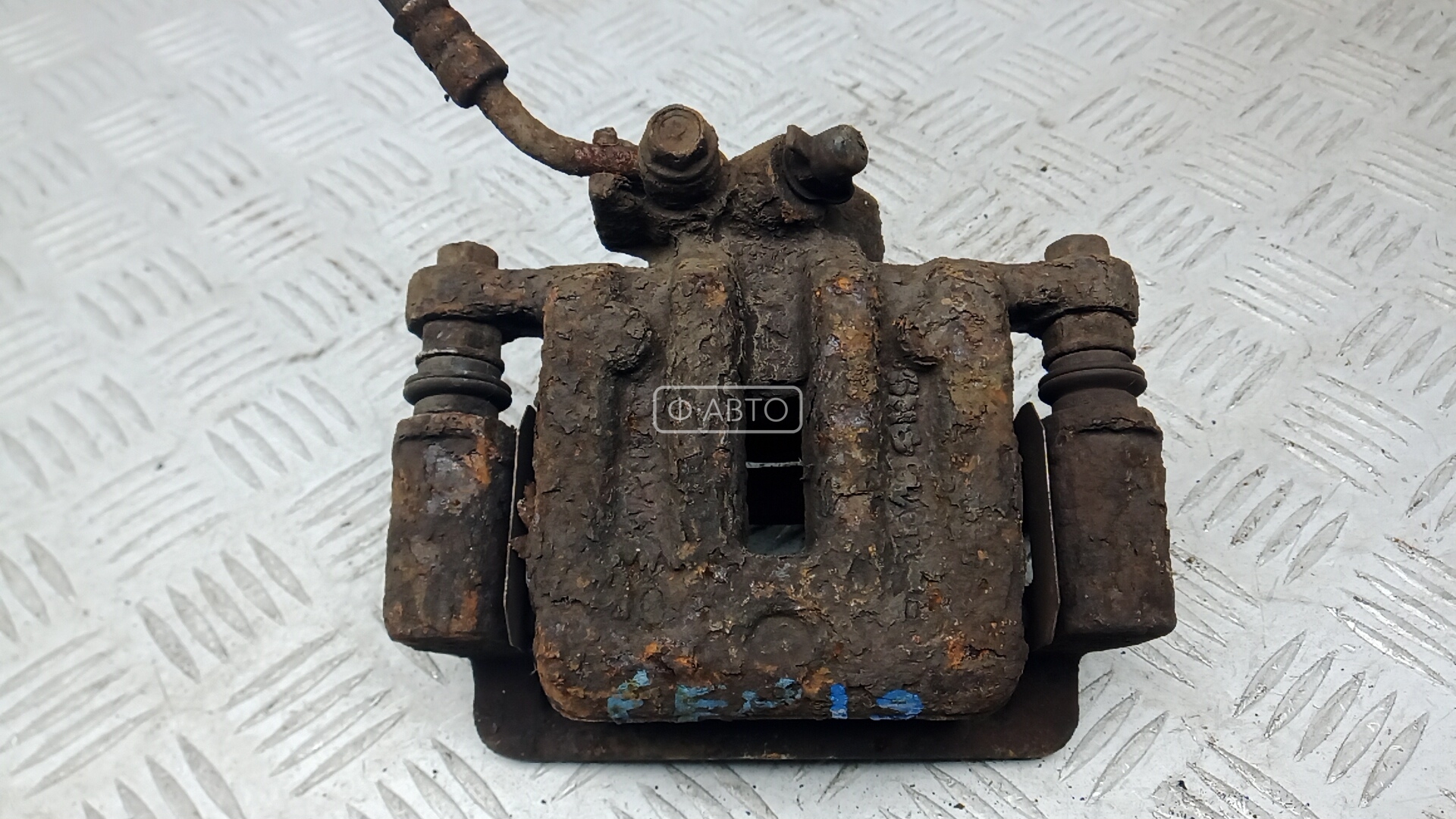 Суппорт тормозной задний левый
