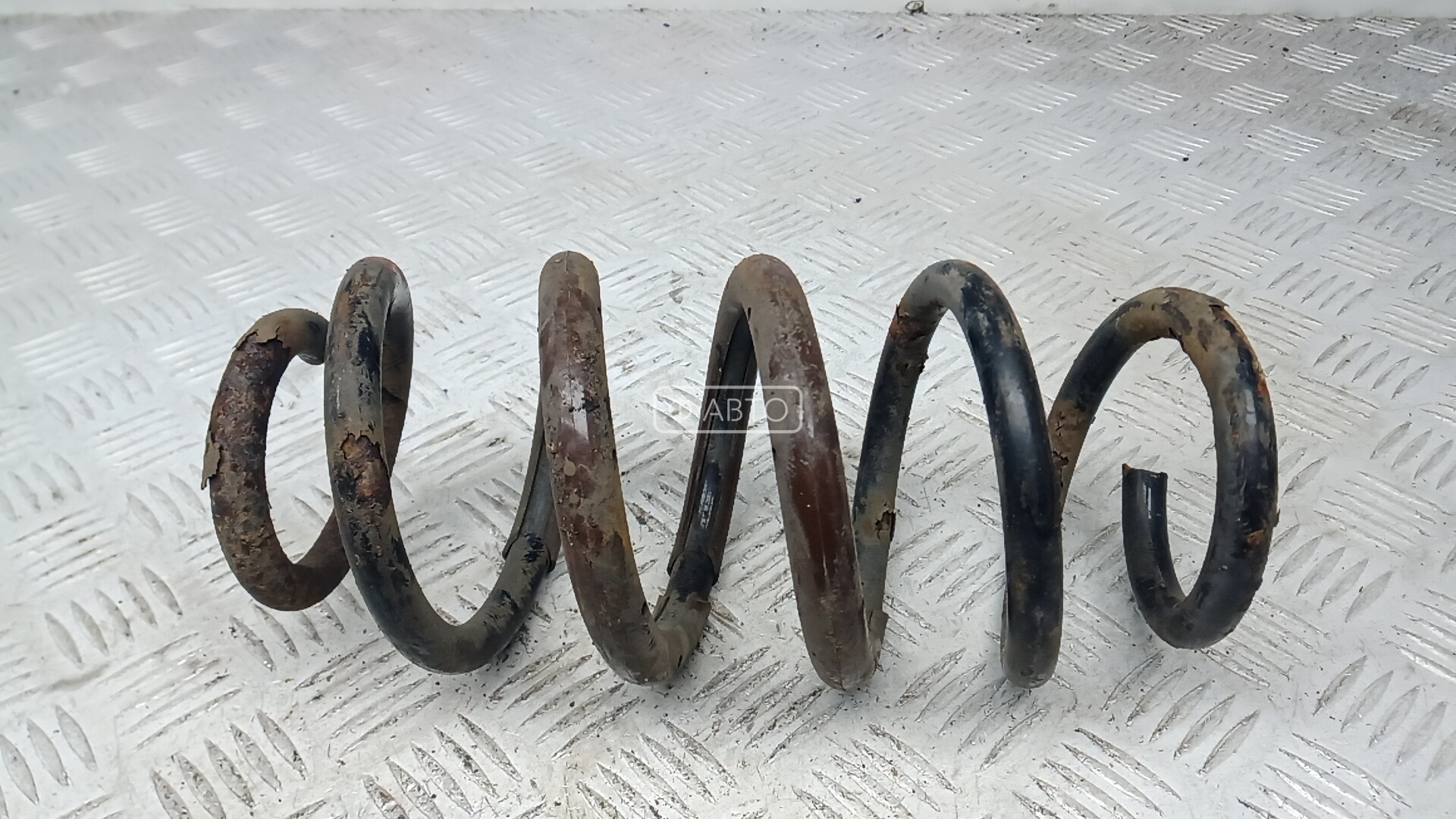 Пружина задняя