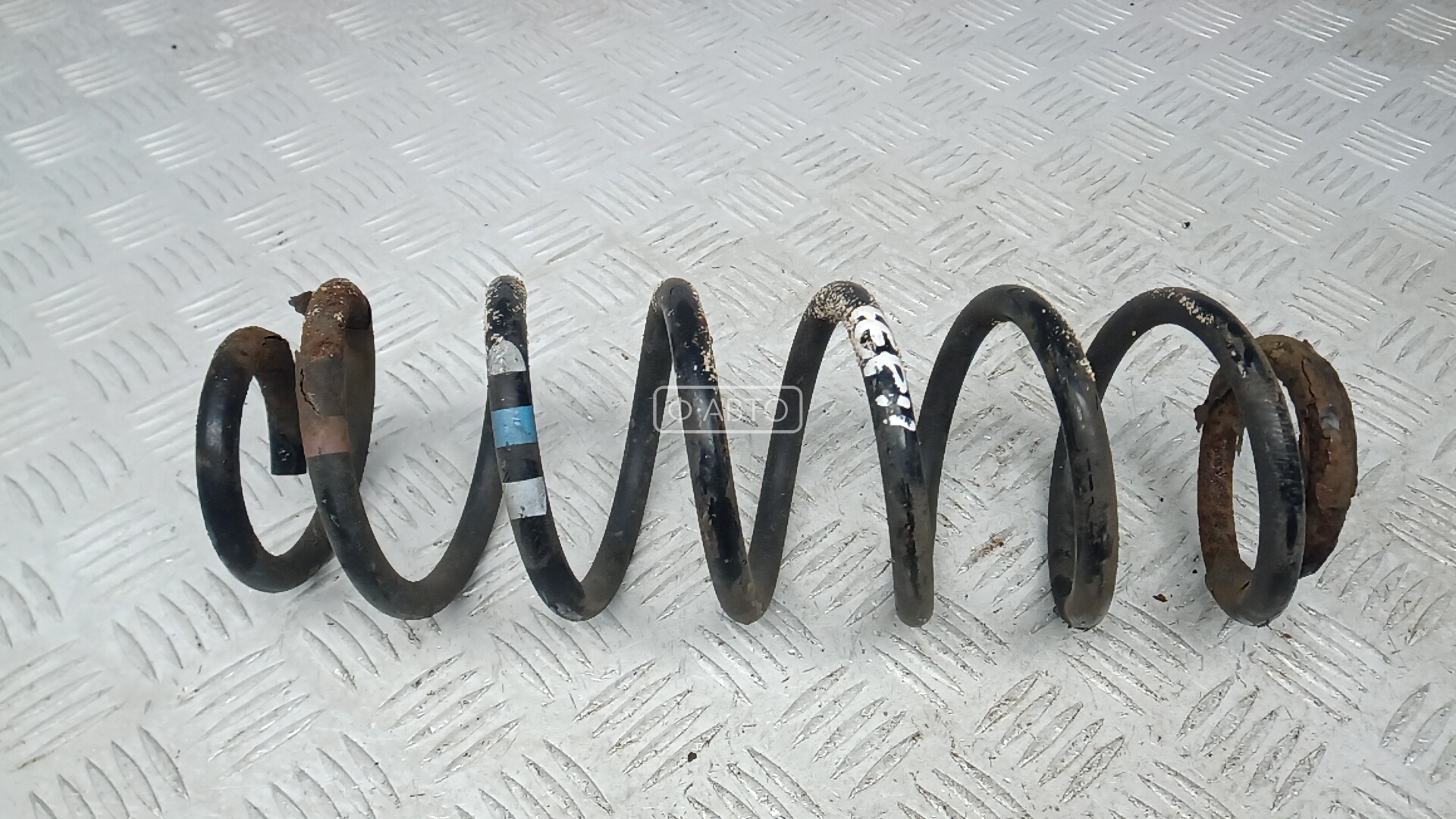 Пружина задняя