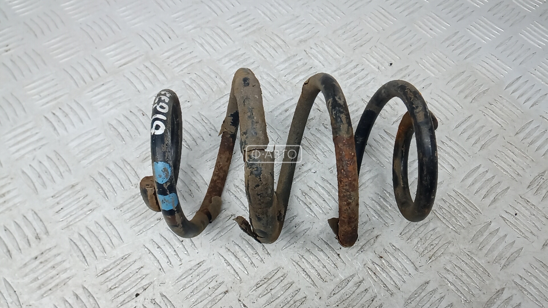 Пружина задняя