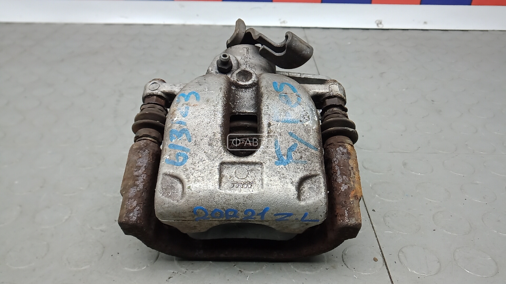 Суппорт тормозной задний левый