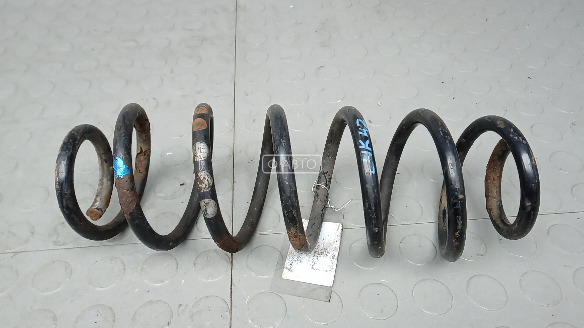 Пружина задняя