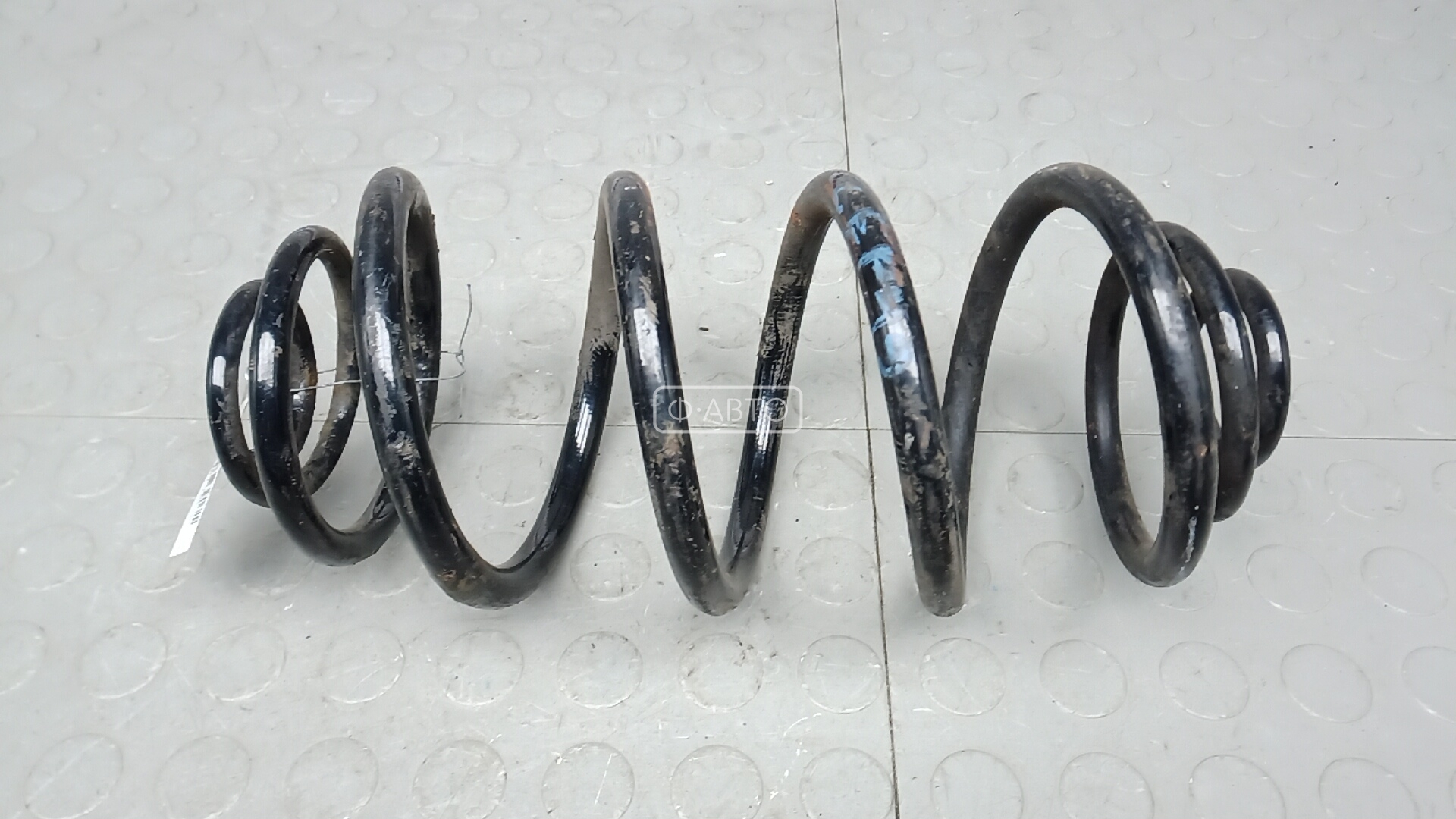 Пружина задняя