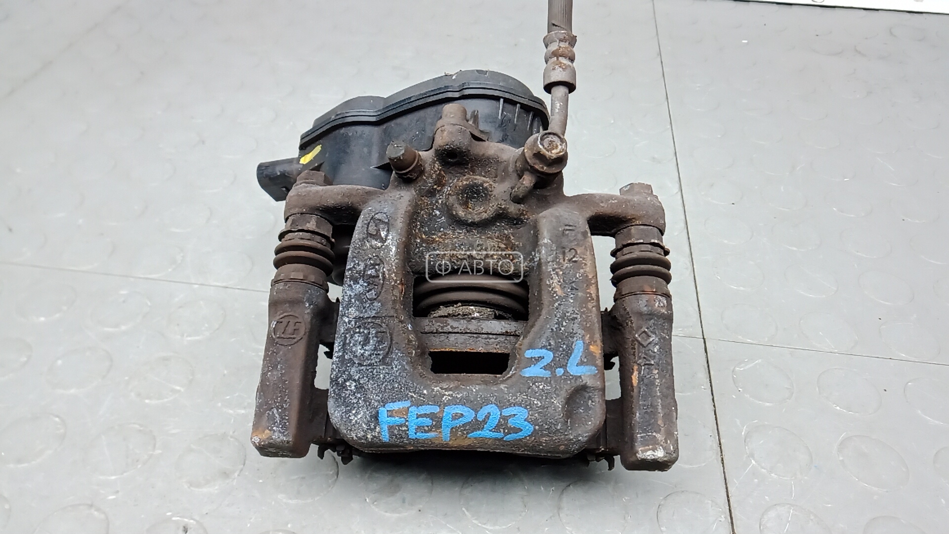 Суппорт тормозной задний левый