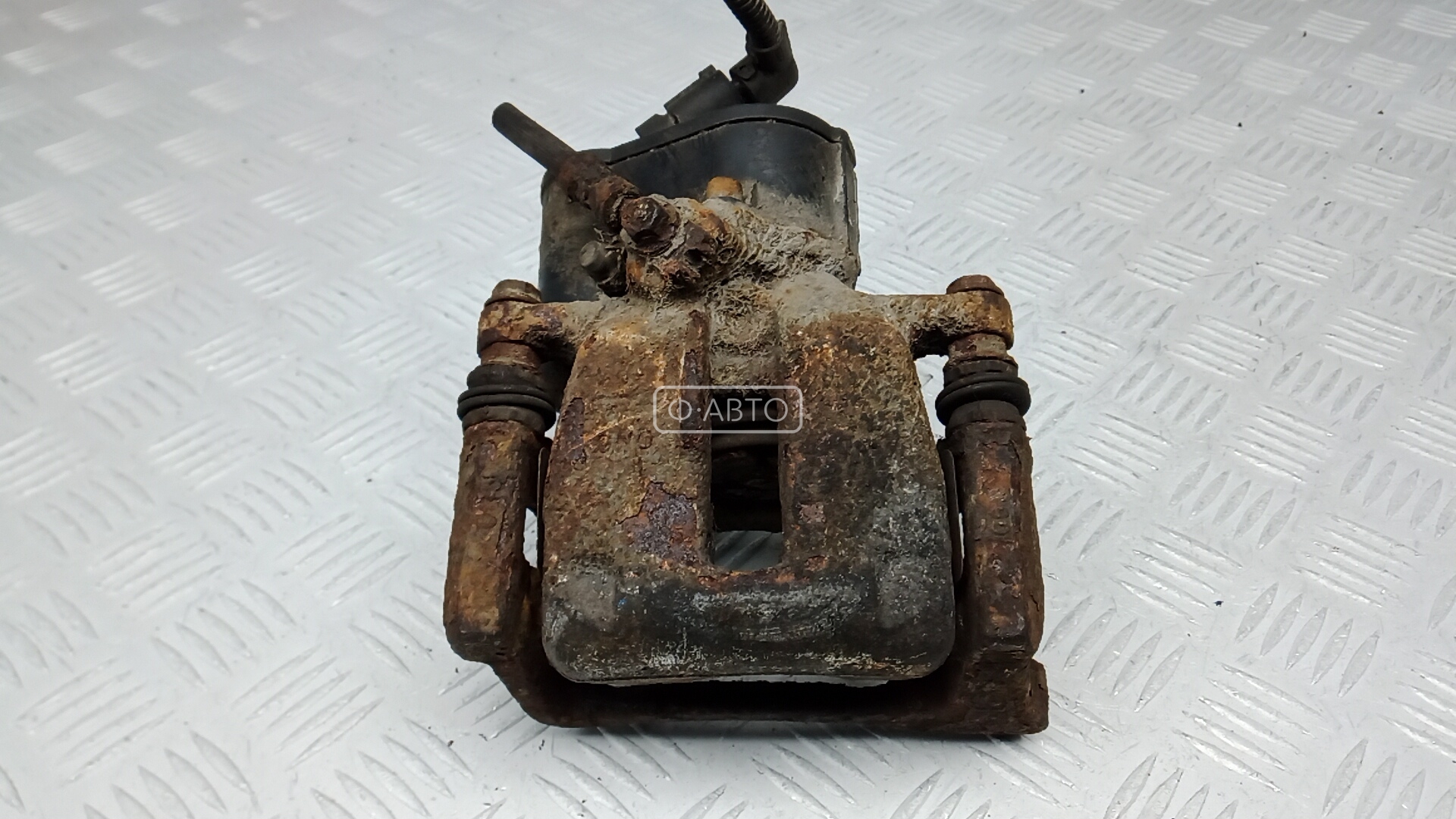 Суппорт тормозной задний правый