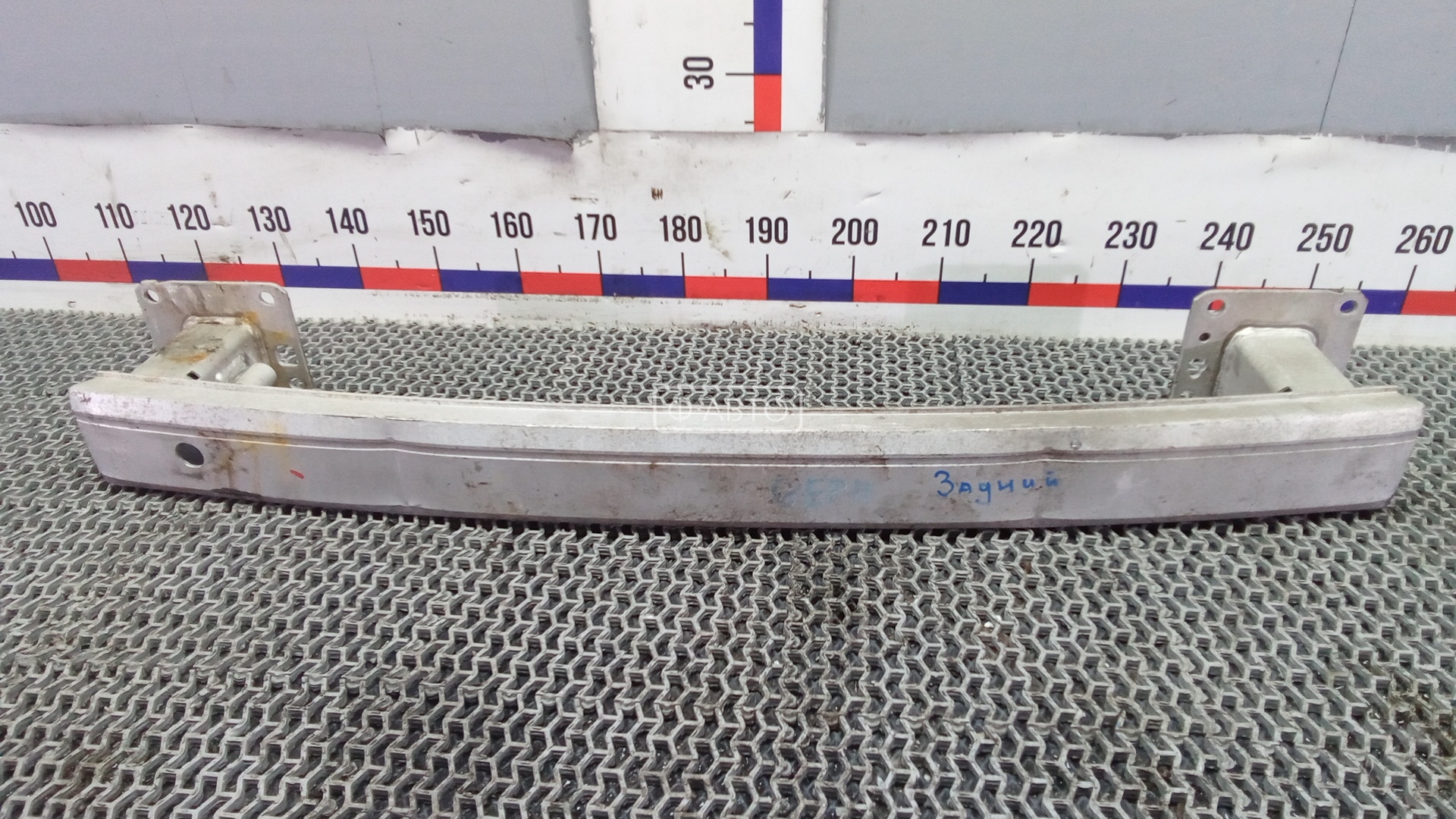 Усилитель бампера задний