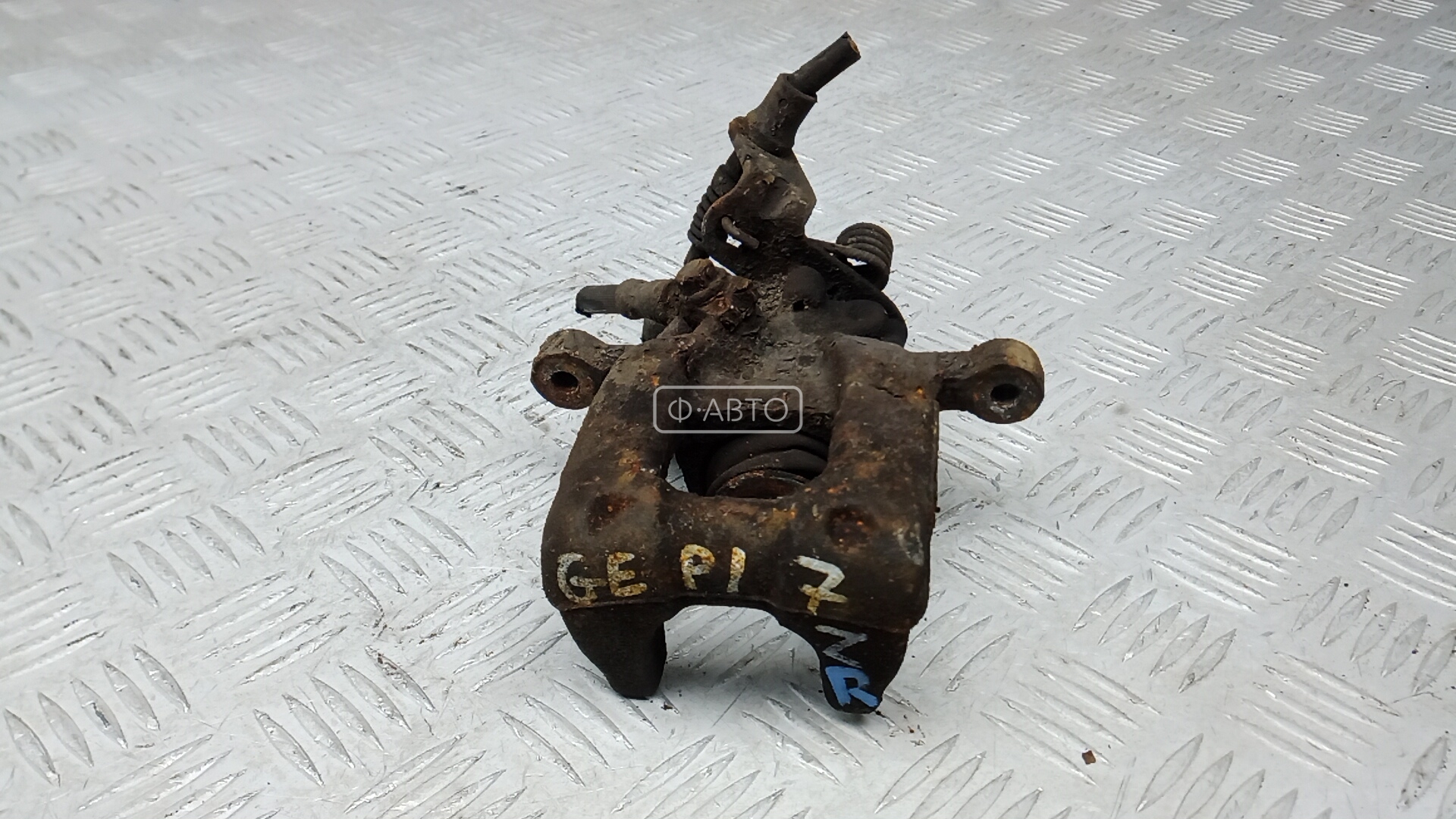 Суппорт тормозной задний правый