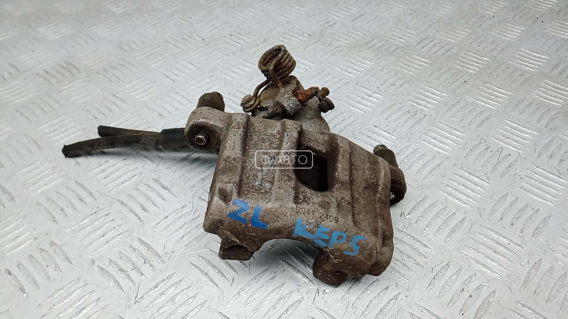 Суппорт тормозной задний левый