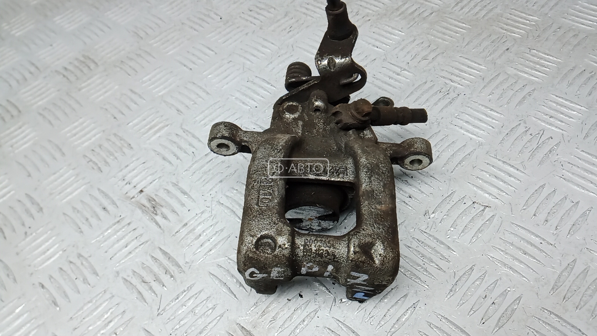Суппорт тормозной задний левый
