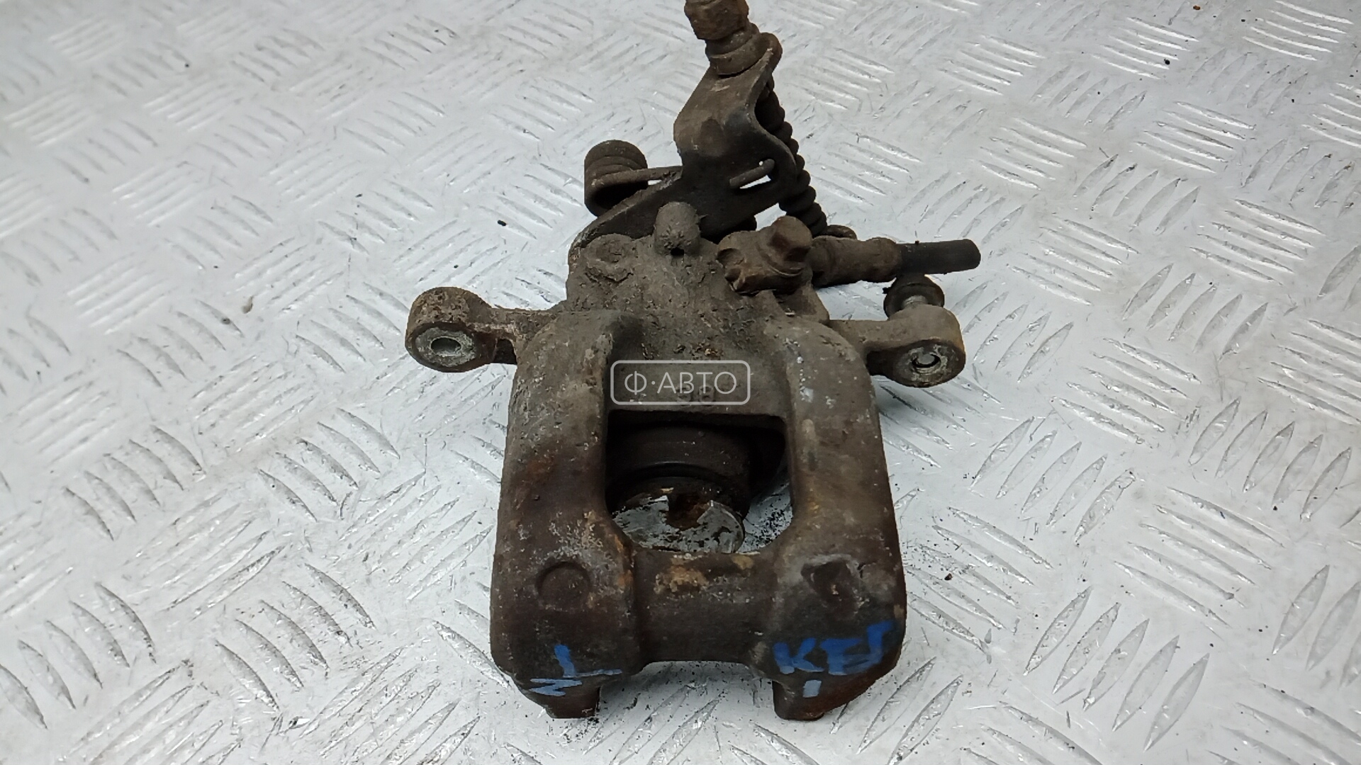 Суппорт тормозной задний левый