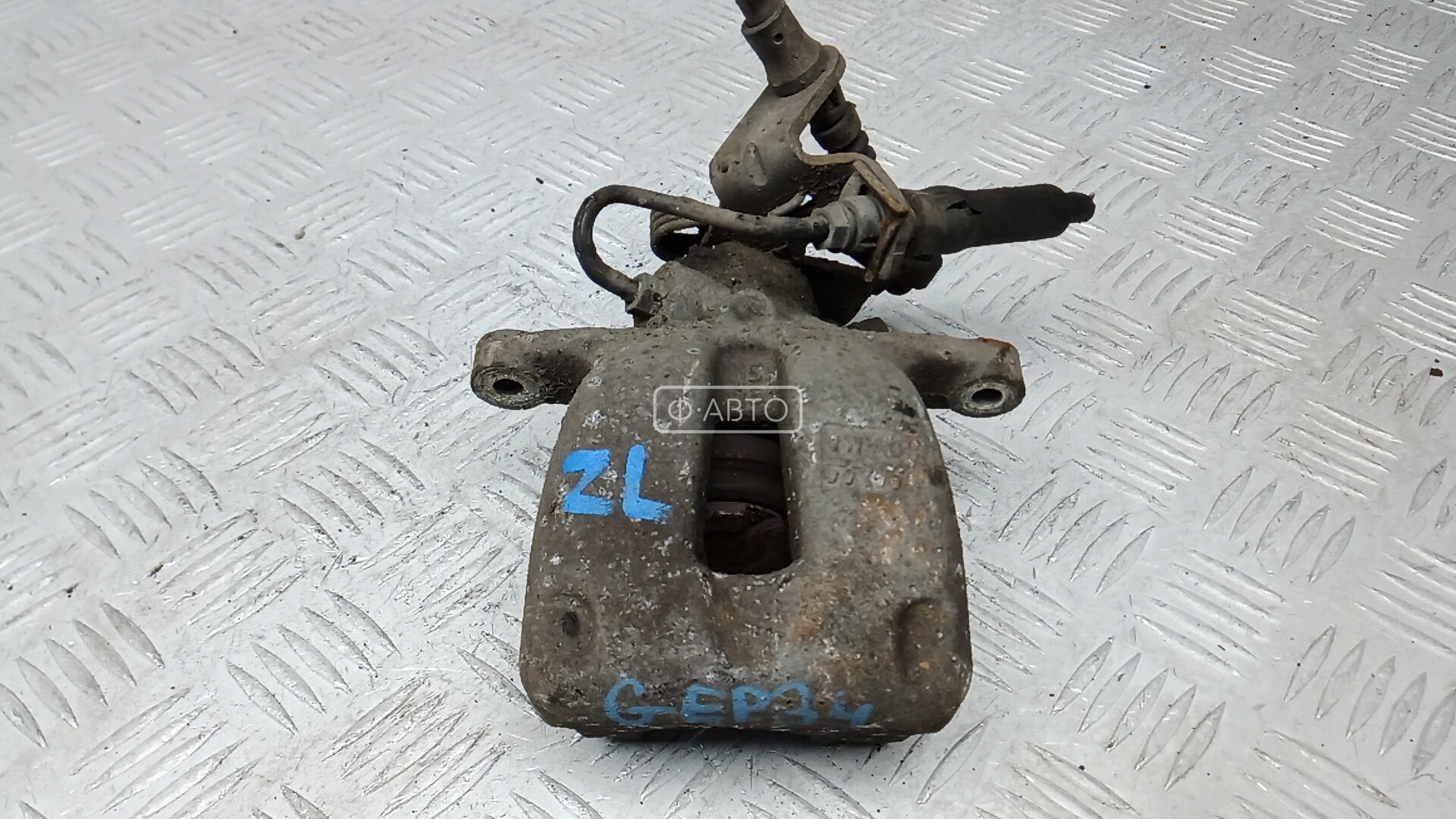 Суппорт тормозной задний левый
