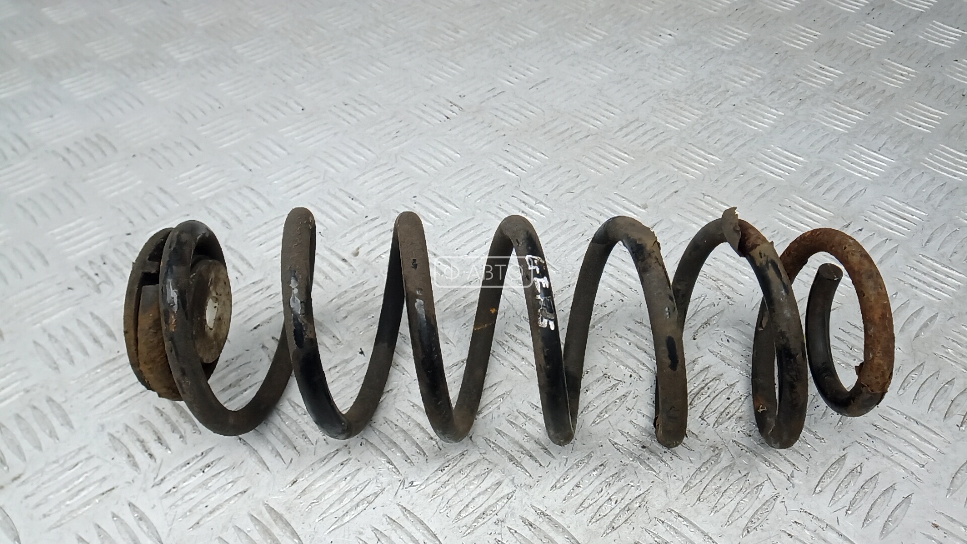 Пружина задняя