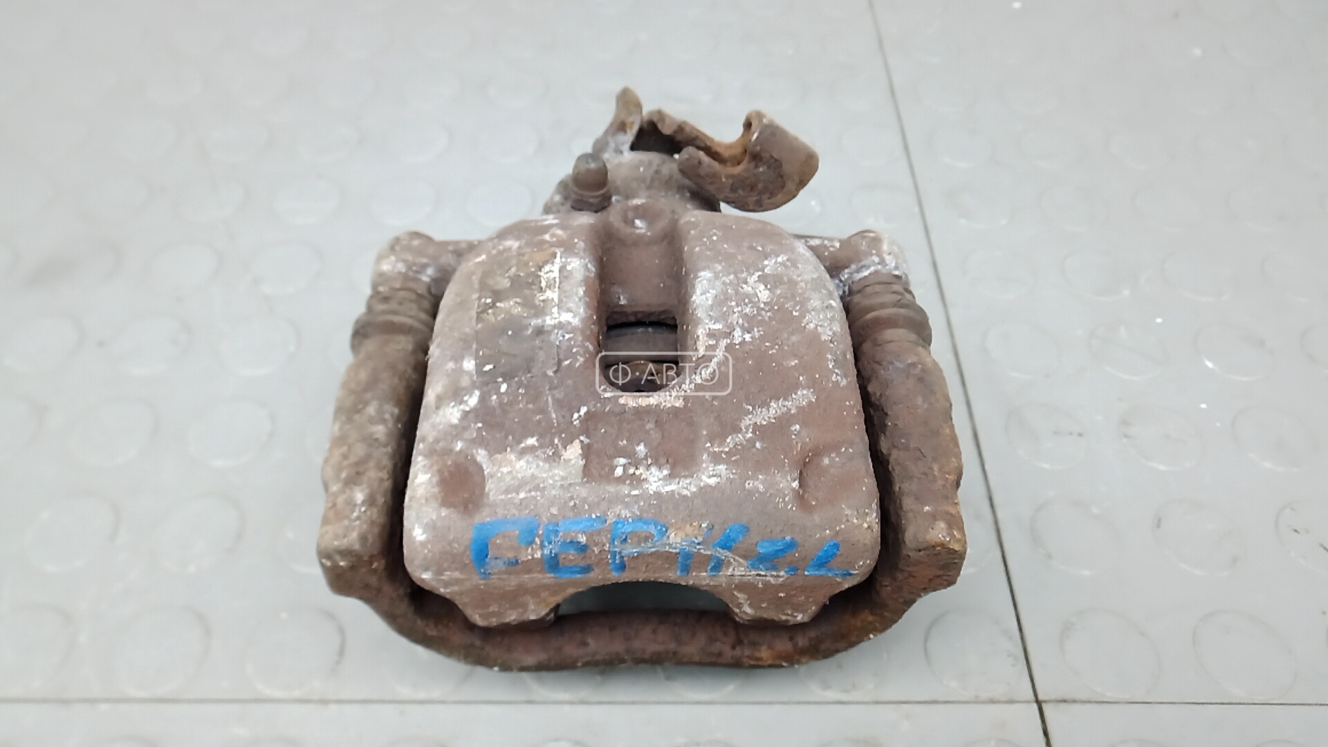 Суппорт тормозной задний левый