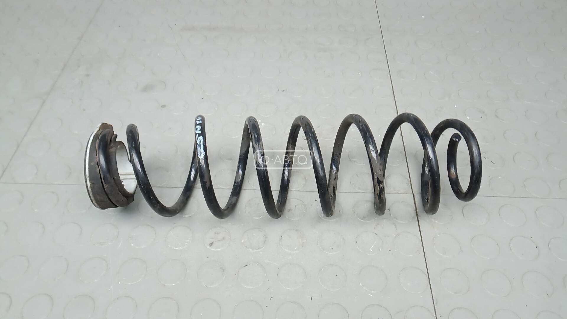 Пружина задняя