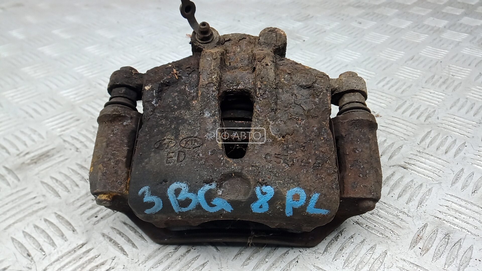 Суппорт тормозной передний левый