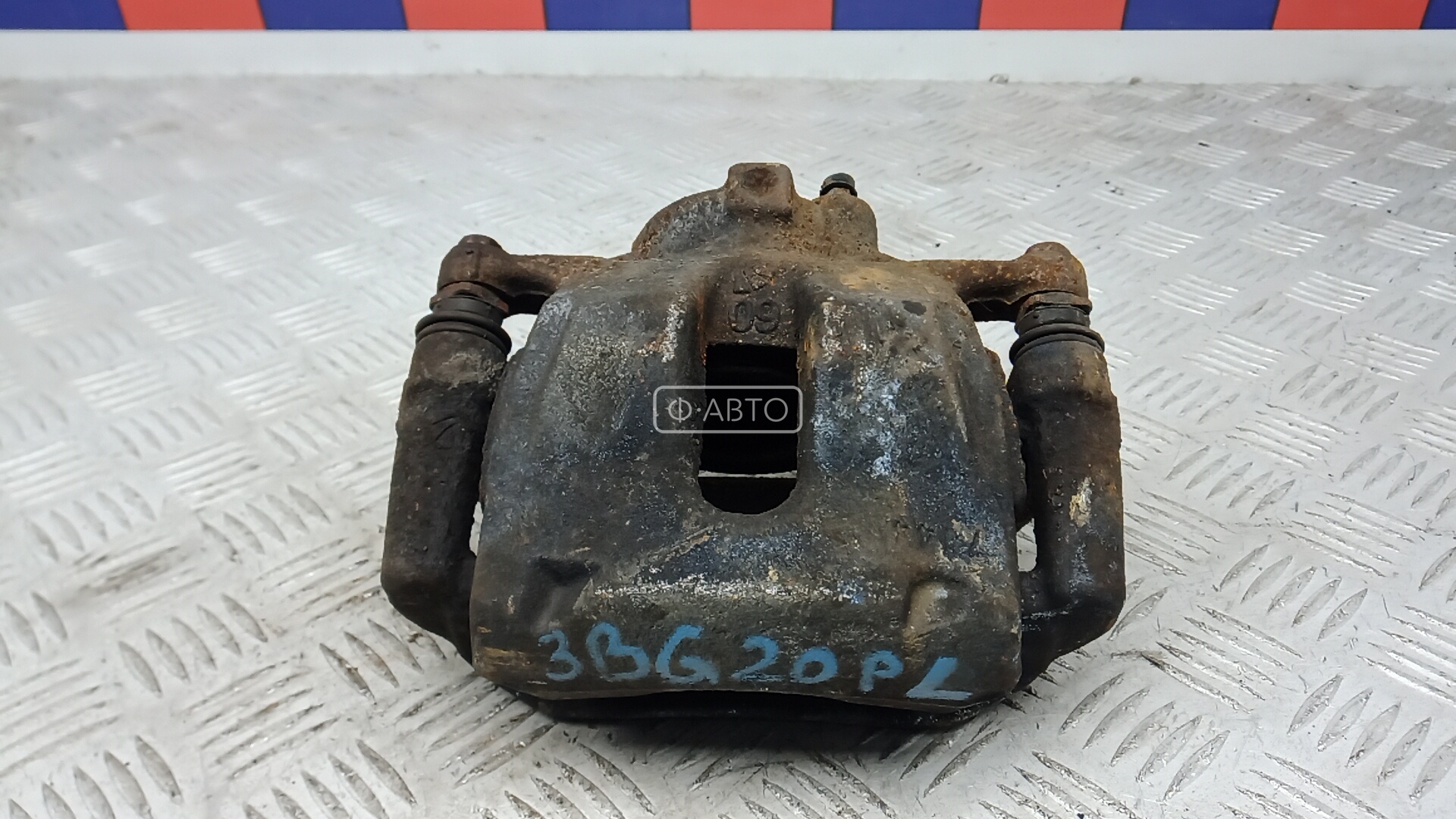 Суппорт тормозной передний левый