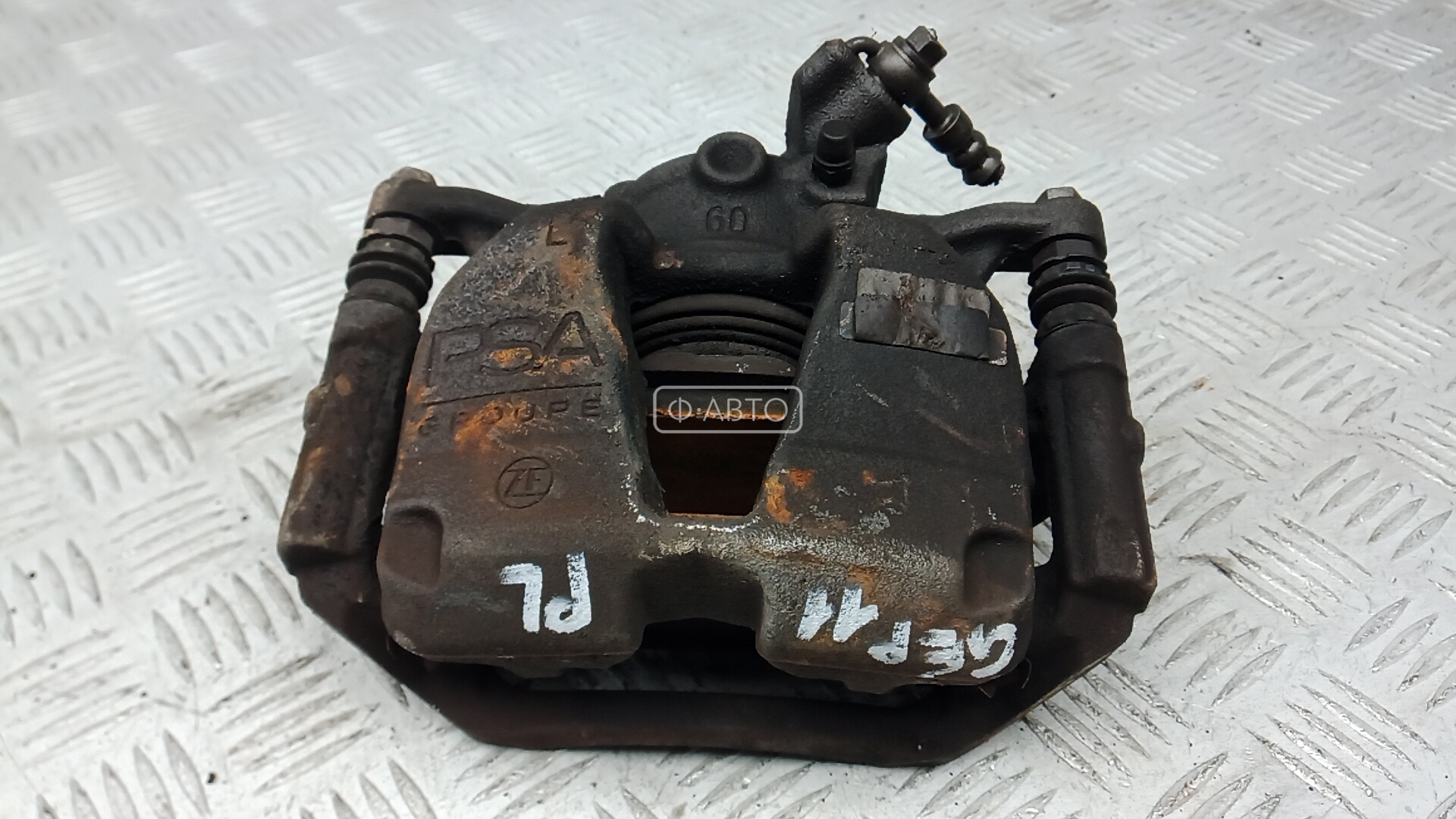 Суппорт тормозной передний левый