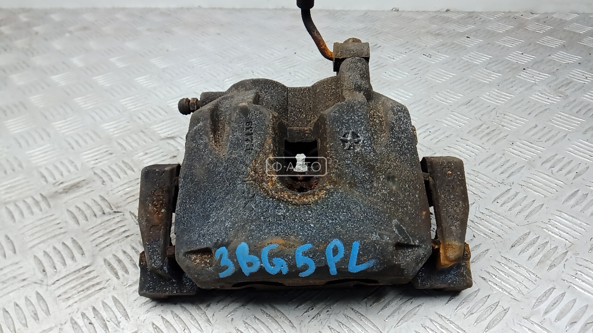 Суппорт тормозной передний левый