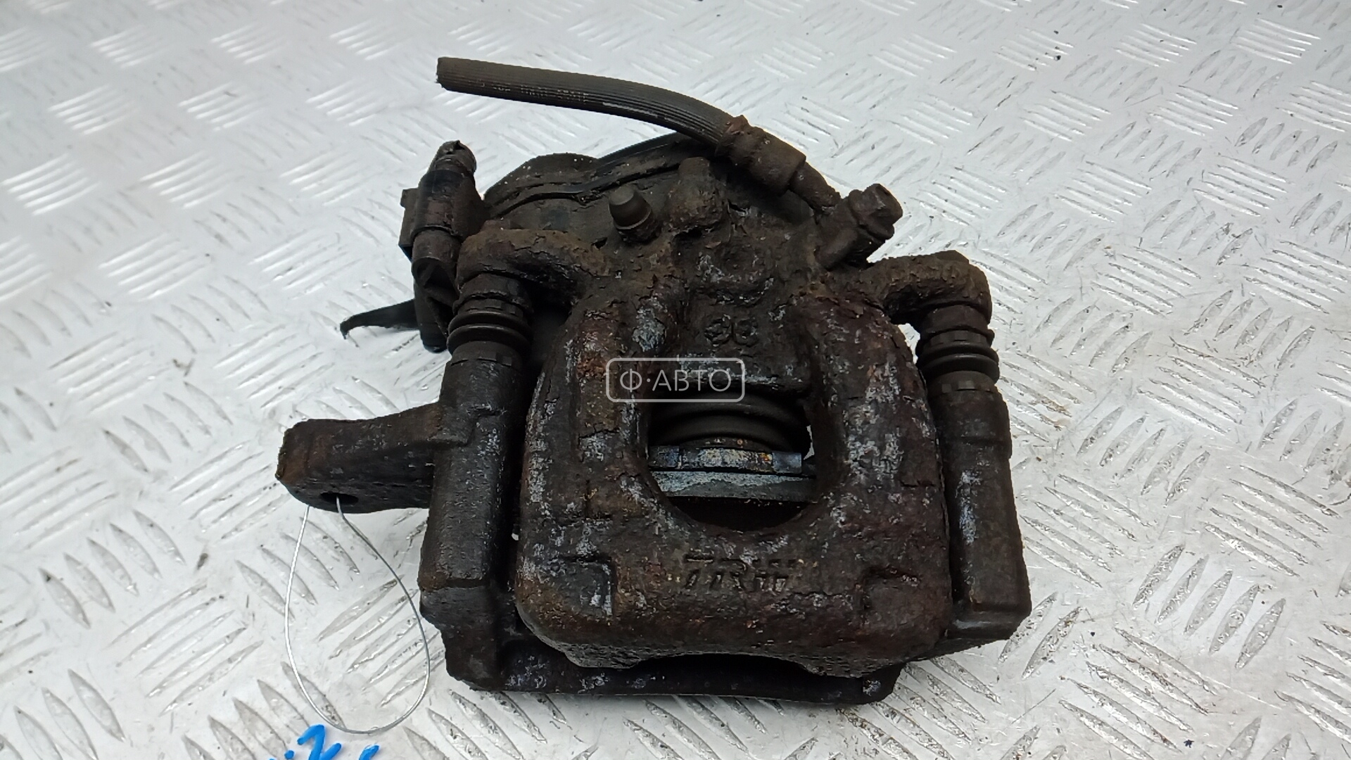 Суппорт тормозной задний левый