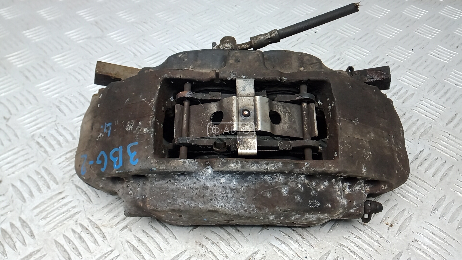 Суппорт тормозной передний левый