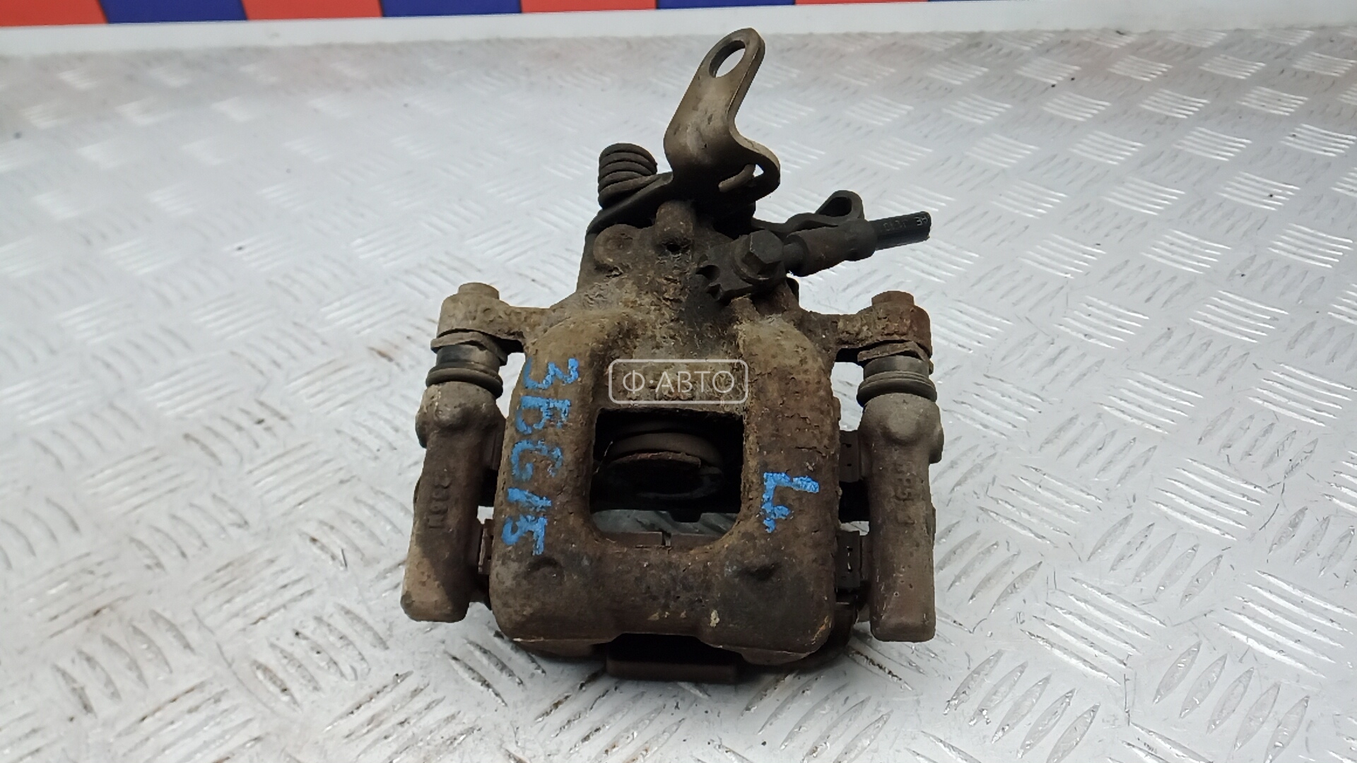 Суппорт тормозной задний левый