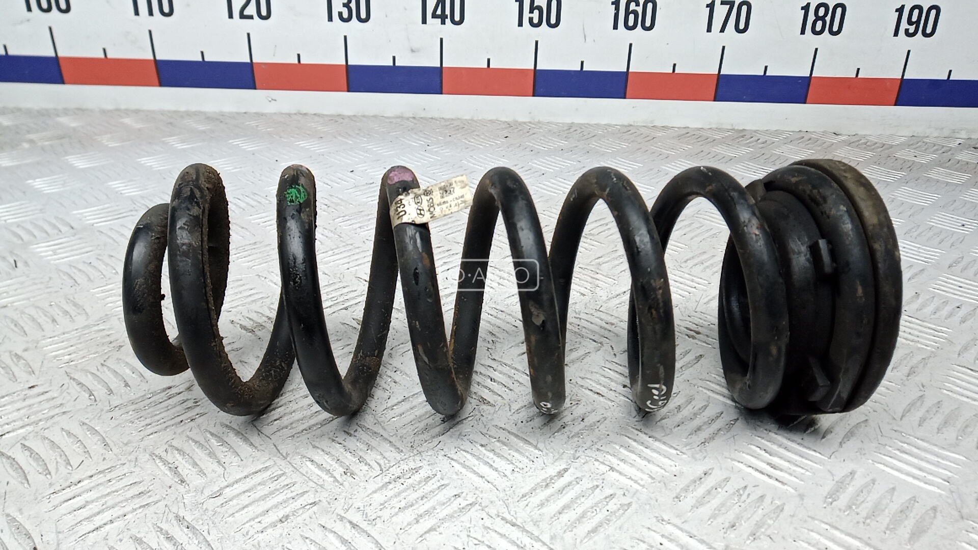 Пружина задняя