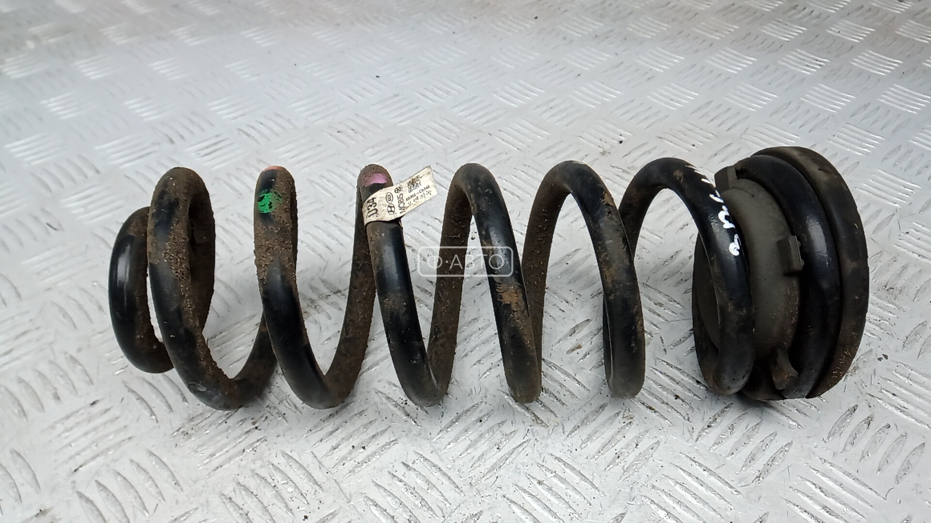 Пружина задняя