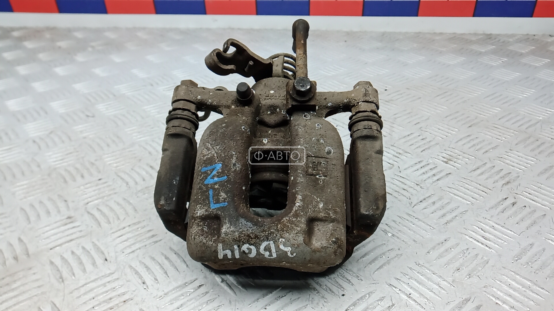 Суппорт тормозной задний левый