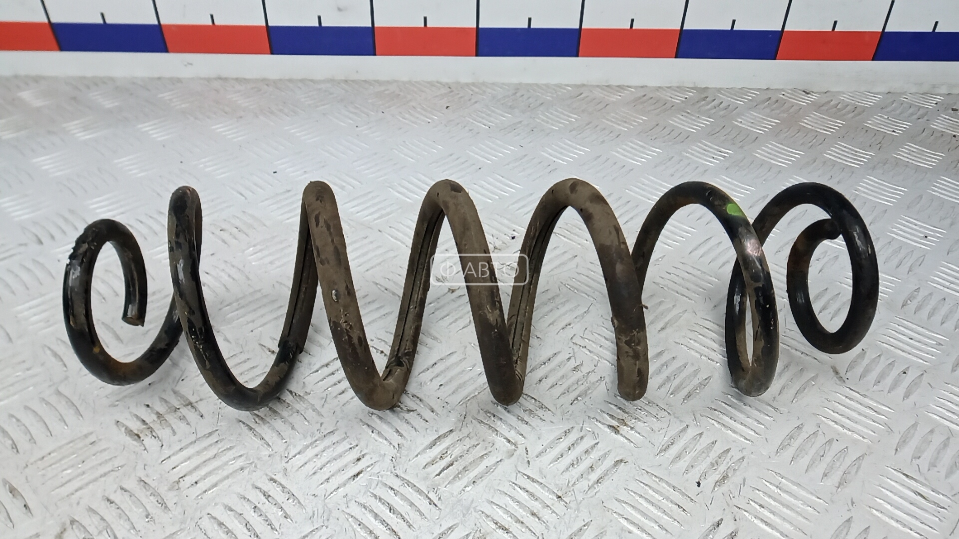 Пружина задняя