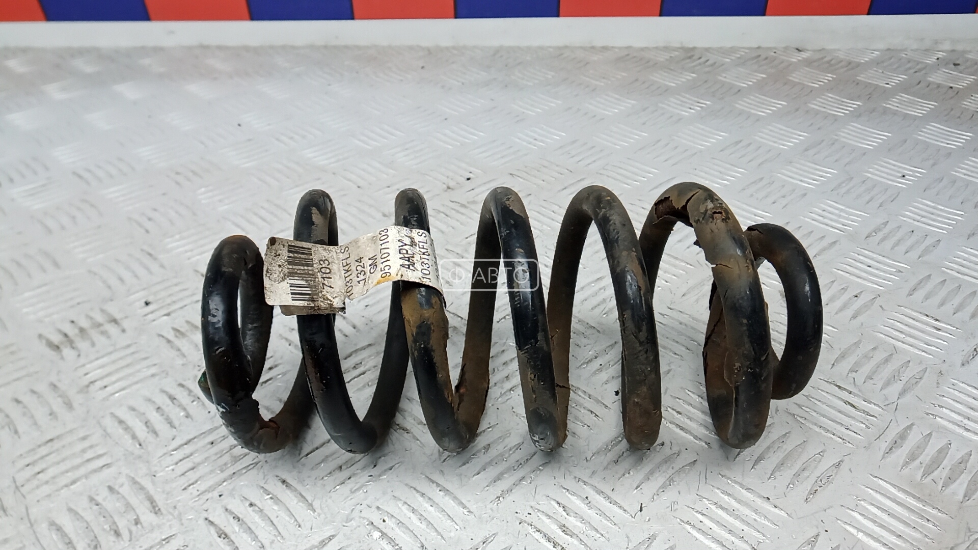 Пружина задняя