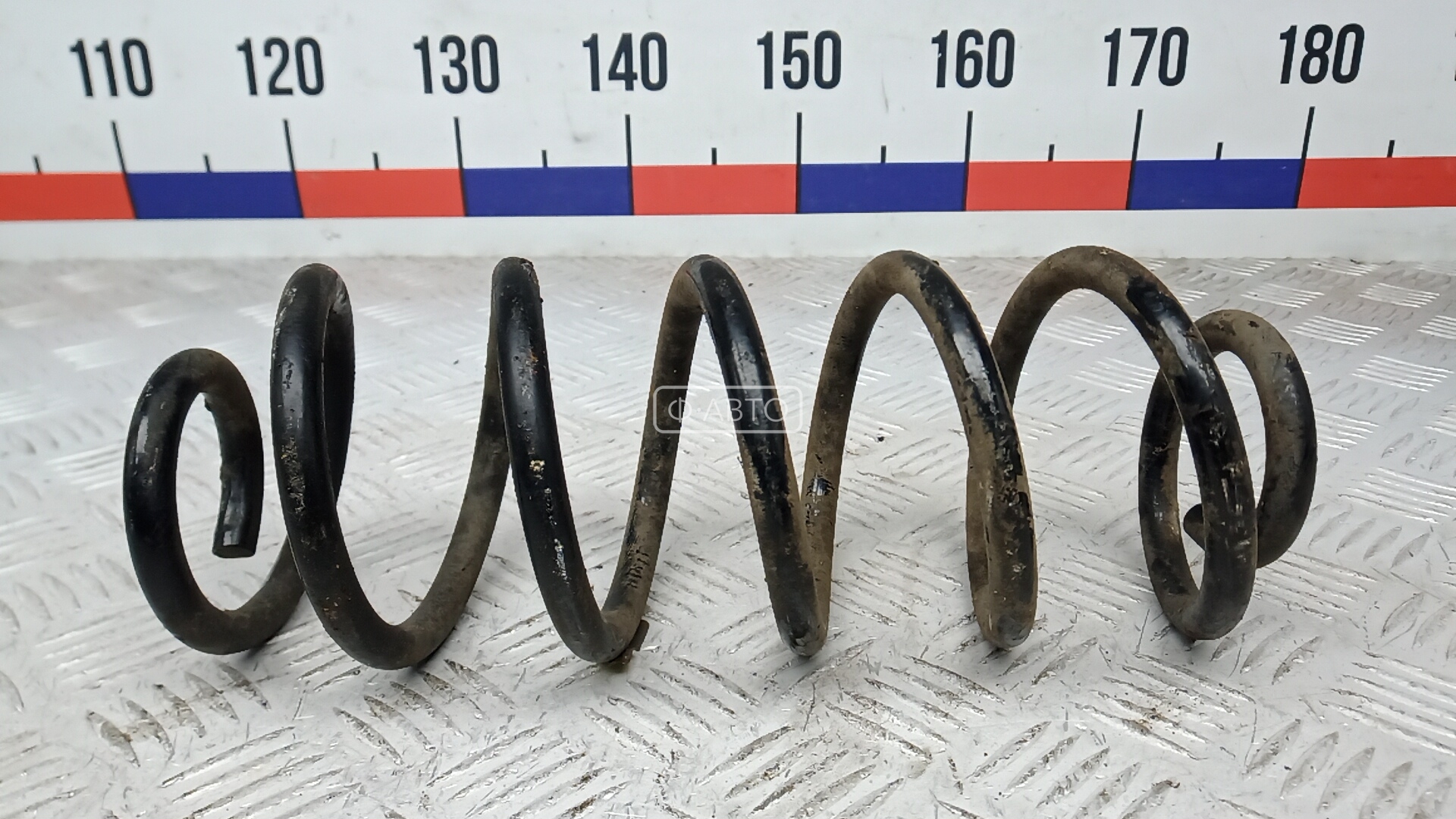 Пружина задняя