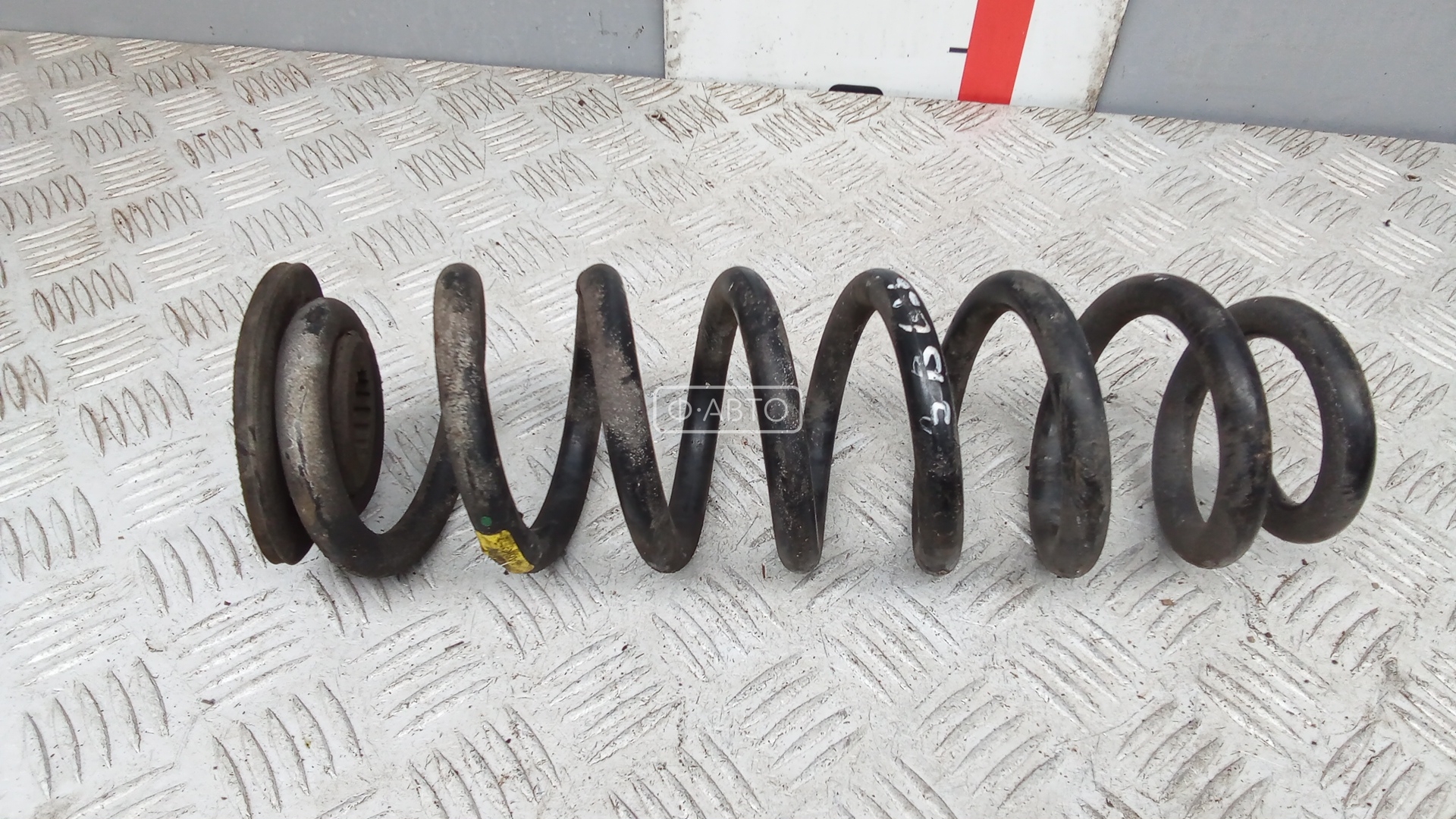 Пружина задняя