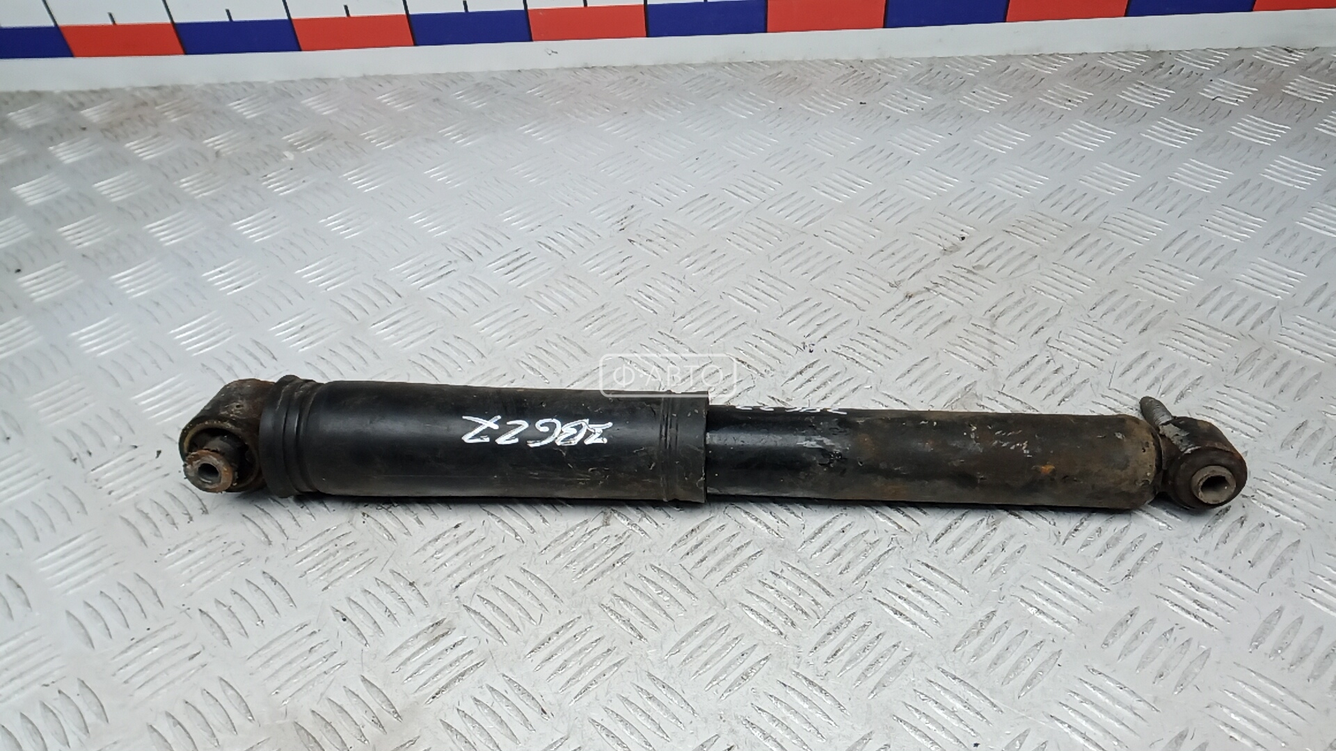 Амортизатор задней балки